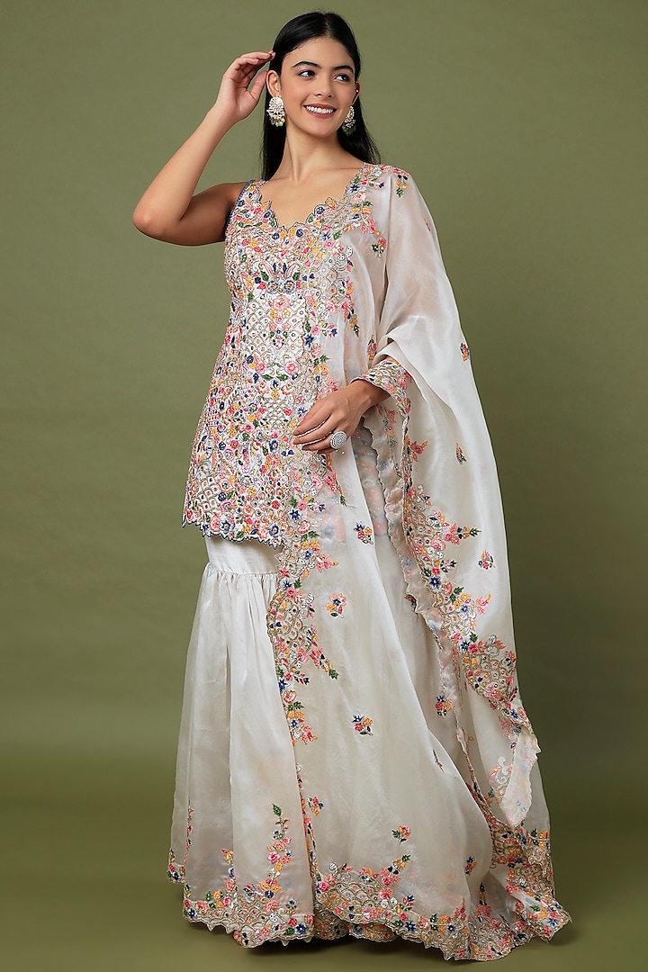 Ivory Raw Silk & Organza Embroidered Gharara Set by Tamanna Punjabi Kapoor
