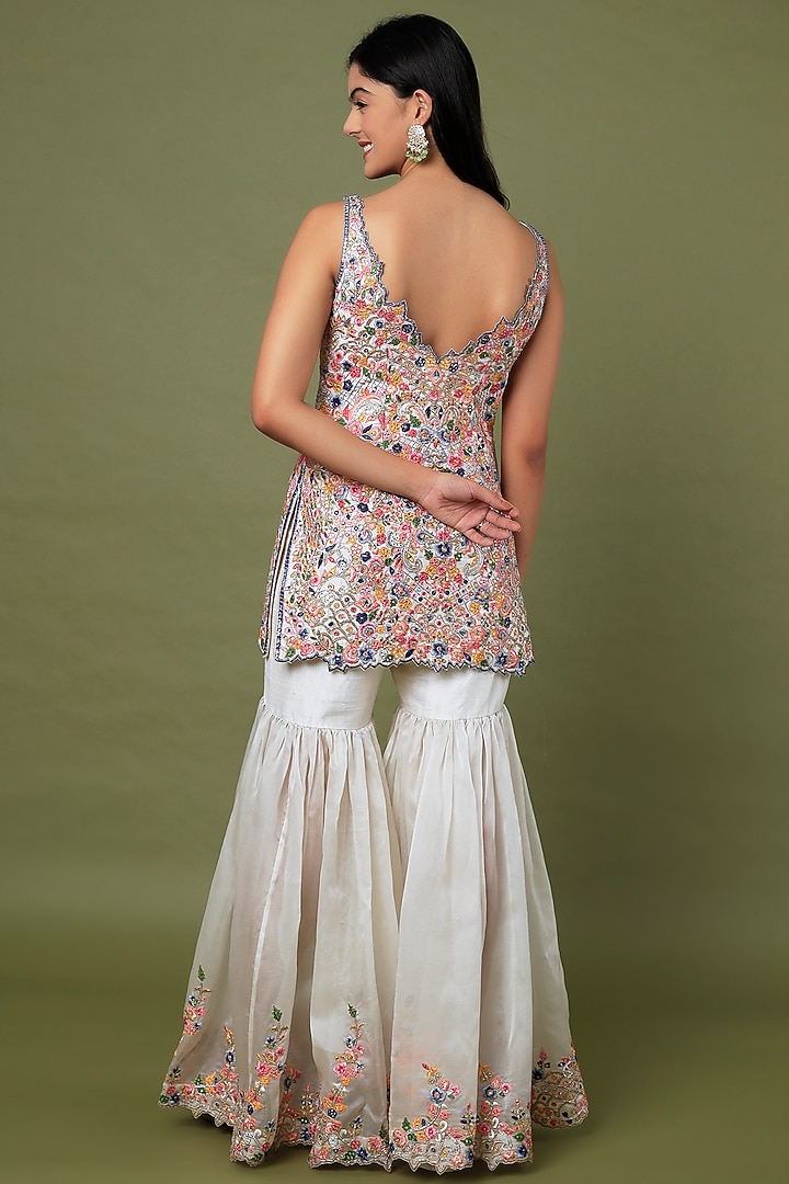 Ivory Raw Silk & Organza Embroidered Gharara Set by Tamanna Punjabi Kapoor at Pernia's Pop Up Shop