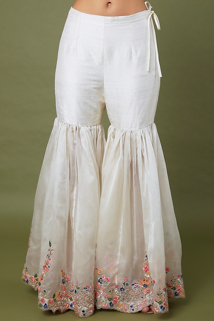 Ivory Raw Silk & Organza Embroidered Gharara Set by Tamanna Punjabi Kapoor at Pernia's Pop Up Shop