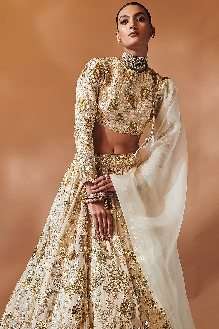 Ivory Georgette Sequins Embroidered Bridal Lehenga Set by Tamanna Punjabi Kapoor at Pernia's Pop Up Shop