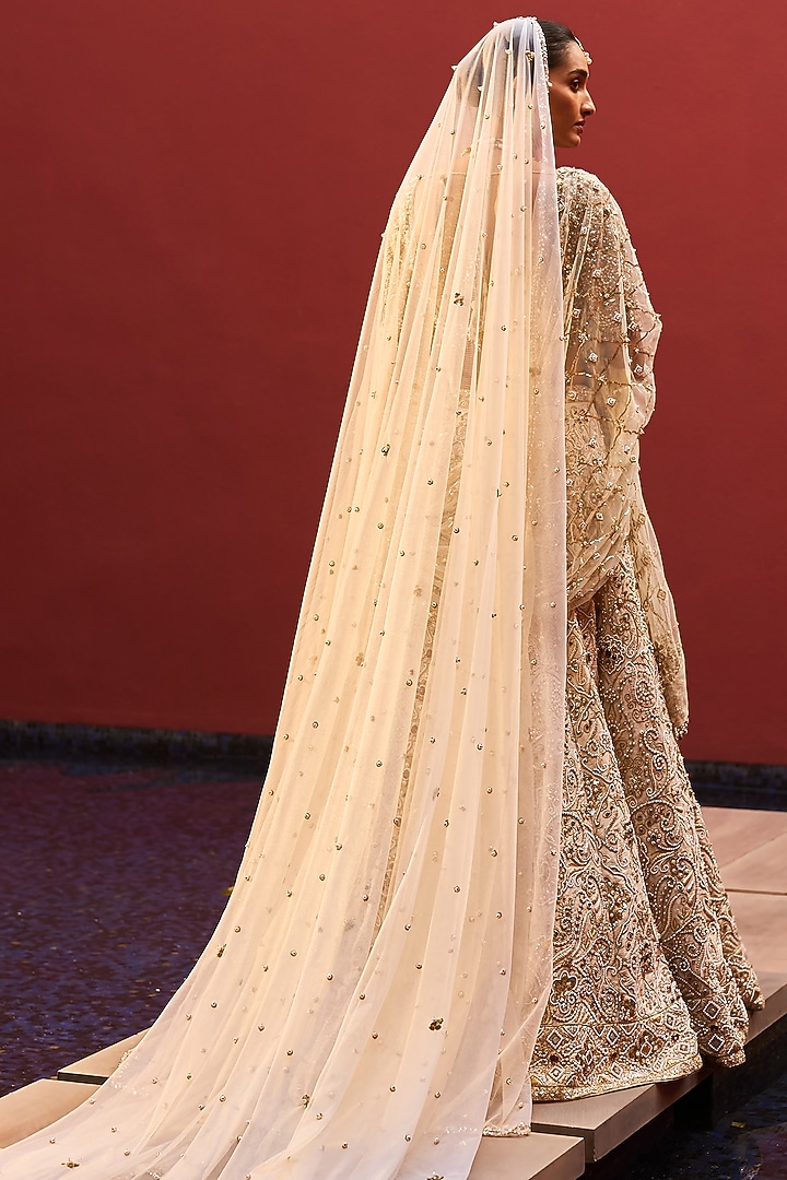Ivory Raw Silk Pearl & Sequin Embroidered Bridal Lehenga Set by Tamanna Punjabi Kapoor at Pernia's Pop Up Shop