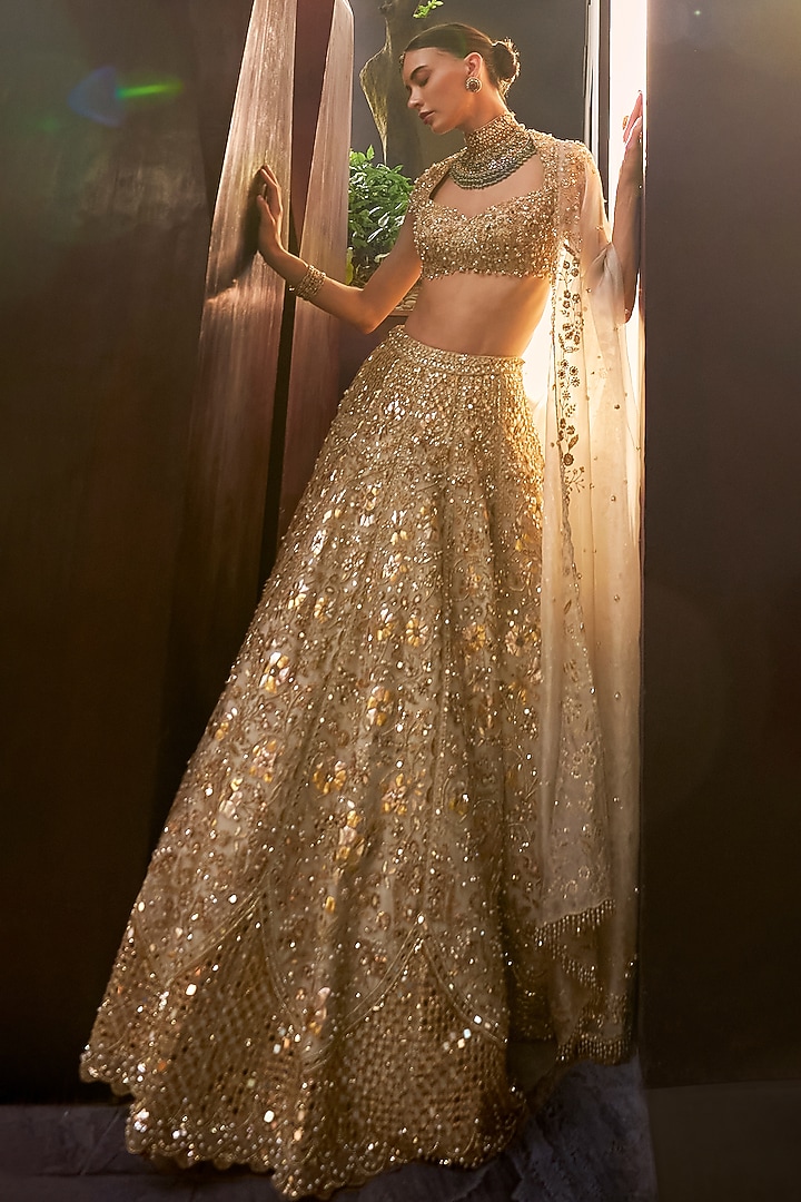 Silver Tissue Mirror & Sequin Embroidered Bridal Lehenga Set by Tamanna Punjabi Kapoor at Pernia's Pop Up Shop