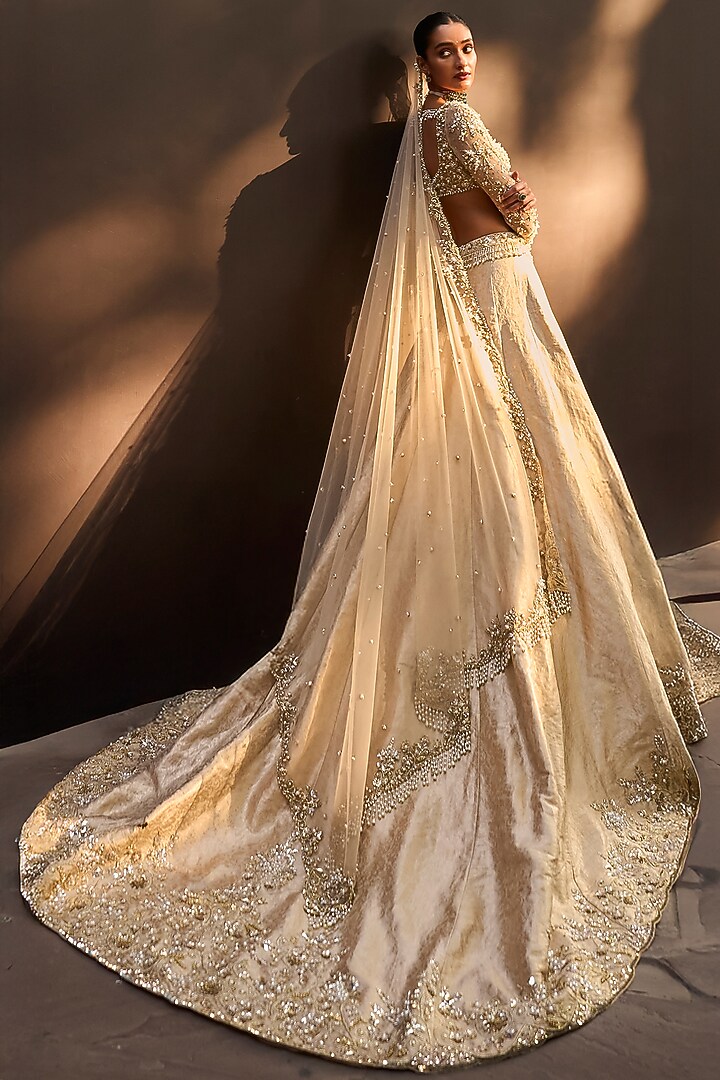 Beige Gold Brocade Silk Pearl & Cutdana Embroidered Bridal Lehenga Set by Tamanna Punjabi Kapoor at Pernia's Pop Up Shop