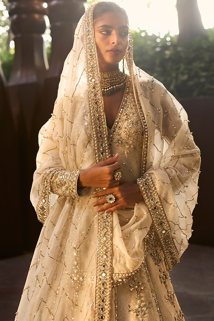 Beige Gold Brocade Silk Pearl & Mirror Embroidered Bridal Lehenga Set by Tamanna Punjabi Kapoor at Pernia's Pop Up Shop