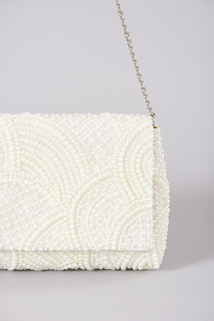 White Embellished Clutch With Sling Chain by The Purple Sack at Pernia's Pop Up Shop