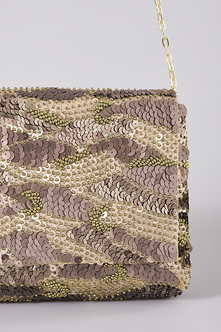 Copper Embellished Clutch With Sling Chain by The Purple Sack at Pernia's Pop Up Shop