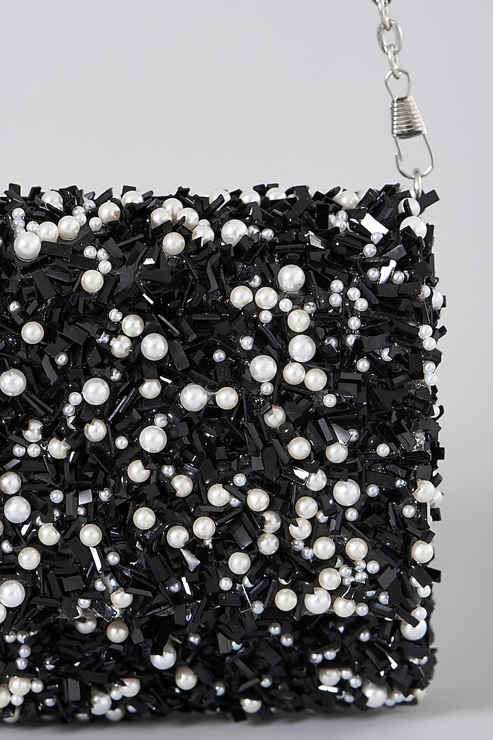 Black Embellished Clutch With Sling Chain by The Purple Sack at Pernia's Pop Up Shop