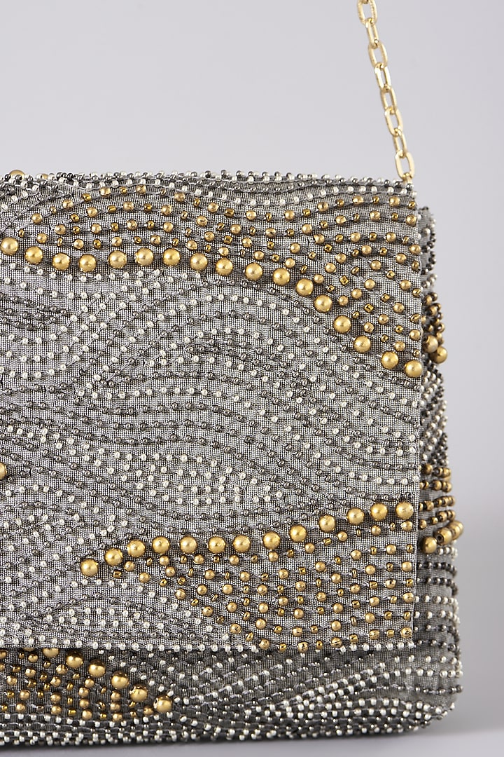Grey Embellished Clutch With Sling Chain by The Purple Sack at Pernia's Pop Up Shop