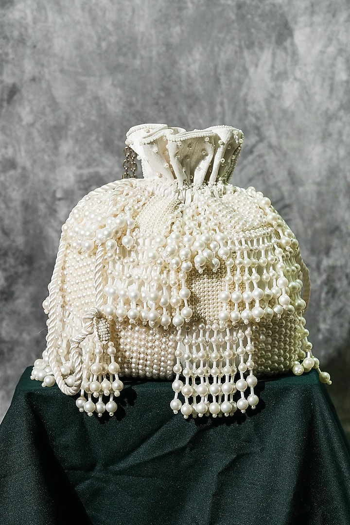 White Raw Silk Handcrafted Potli by The Purple Sack at Pernia's Pop Up Shop