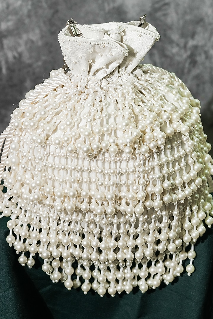 White Raw Silk Handcrafted Potli by The Purple Sack at Pernia's Pop Up Shop