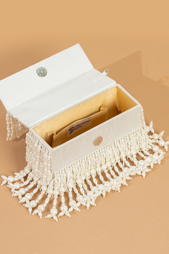 White Raw Silk Pearl Work Handcrafted Clutch by The Purple Sack at Pernia's Pop Up Shop