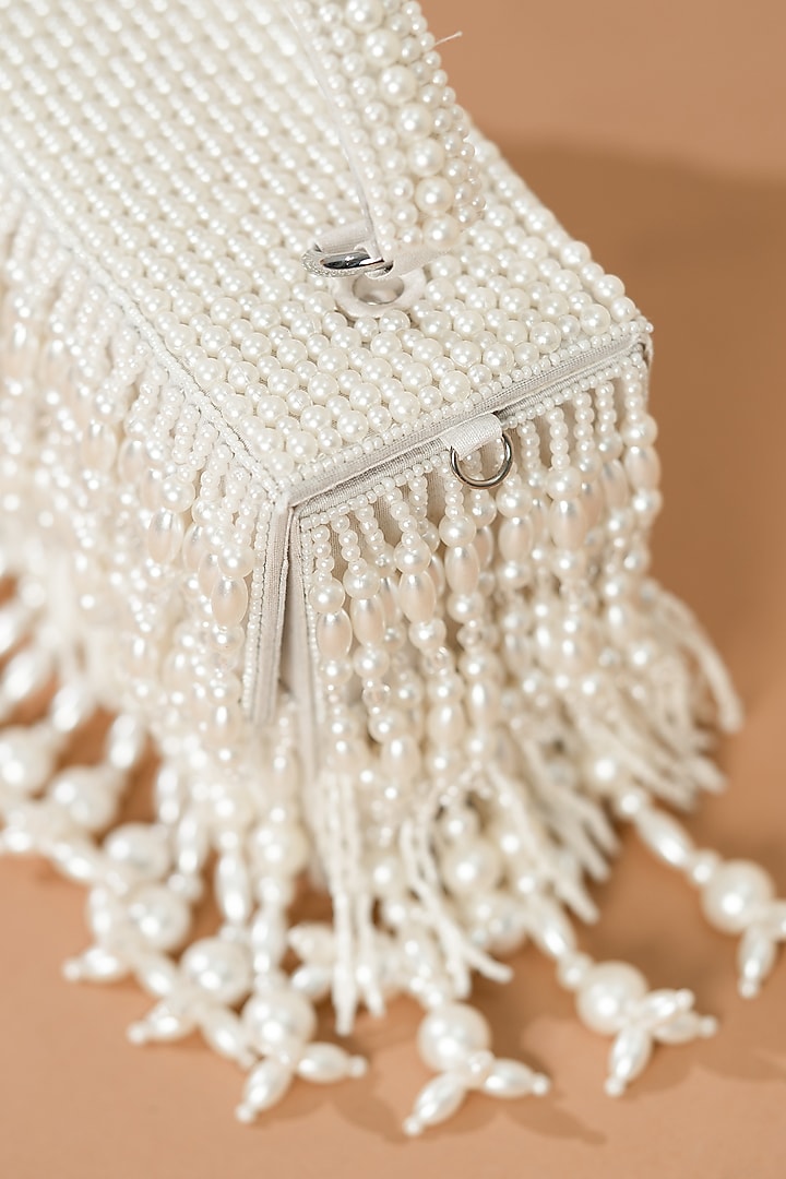 White Raw Silk Pearl Work Handcrafted Clutch by The Purple Sack at Pernia's Pop Up Shop
