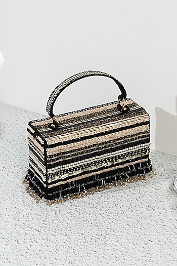 Black Raw Silk Handcrafted Clutch by The Purple Sack at Pernia's Pop Up Shop