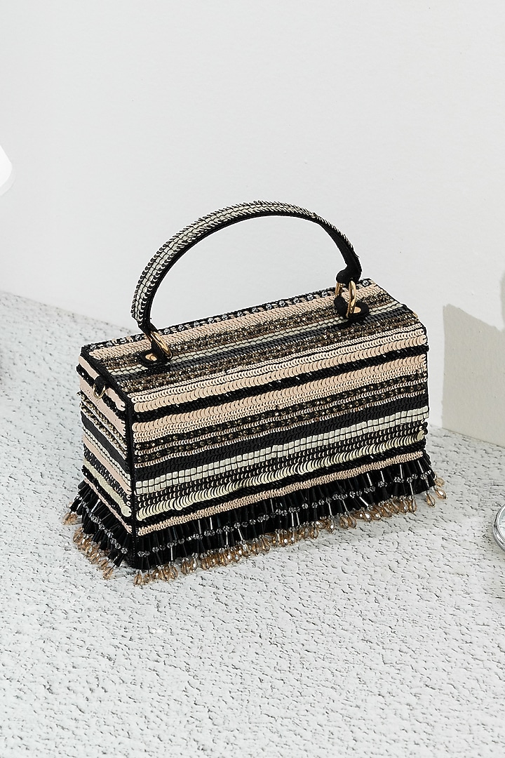 Black Raw Silk Handcrafted Clutch by The Purple Sack at Pernia's Pop Up Shop