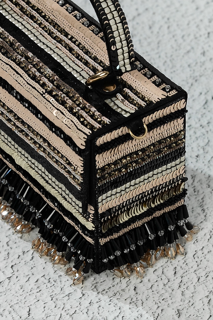 Black Raw Silk Handcrafted Clutch by The Purple Sack at Pernia's Pop Up Shop