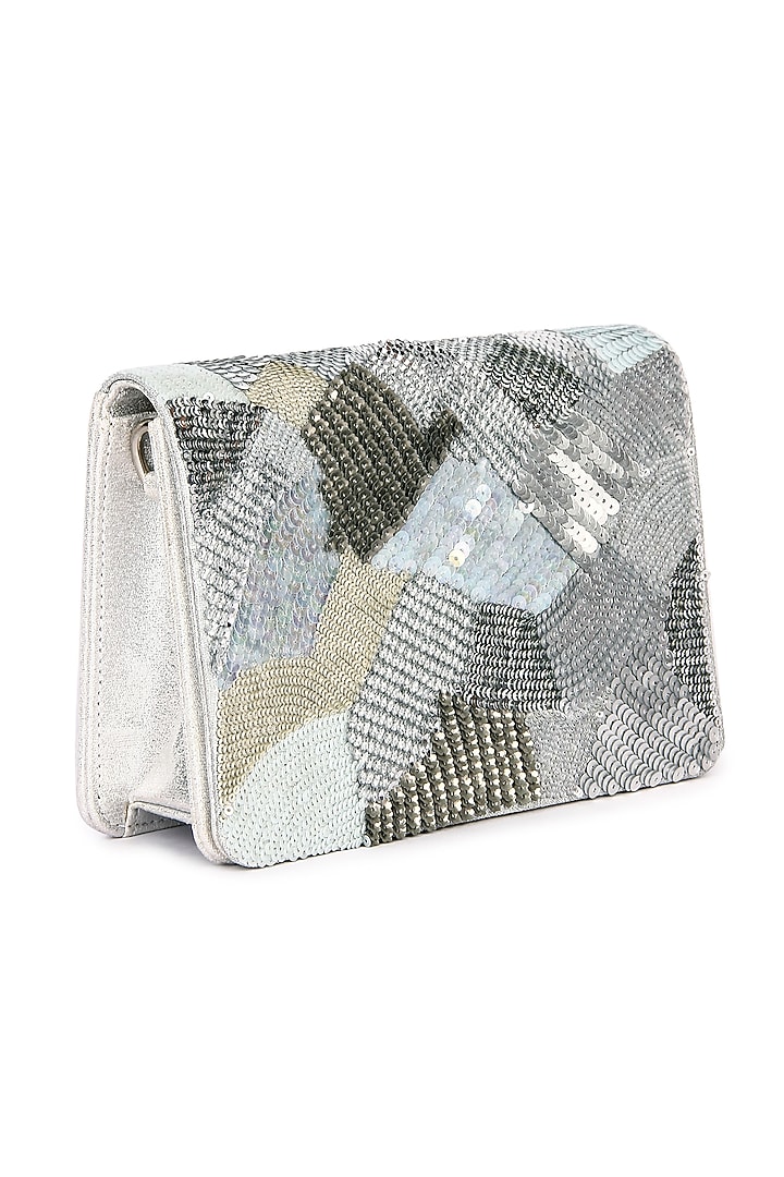 Silver Leatherette Hand Embroidered Clutch by The Purple Sack at Pernia's Pop Up Shop