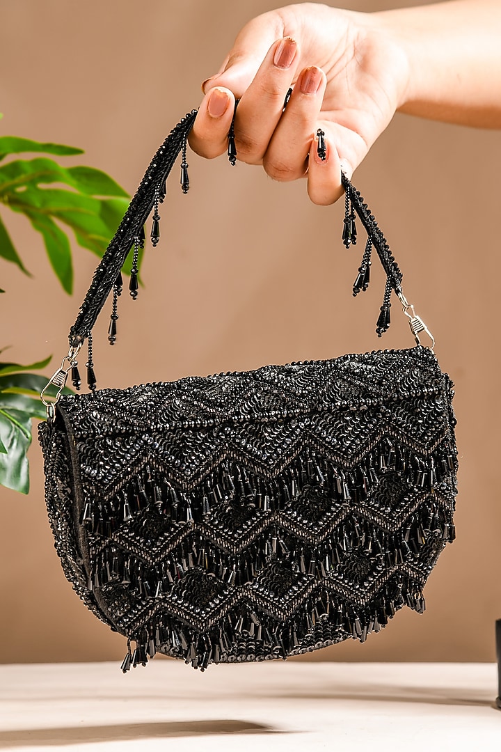 Black Raw Silk Hand Embroidered Latkan Clutch by The Purple Sack at Pernia's Pop Up Shop