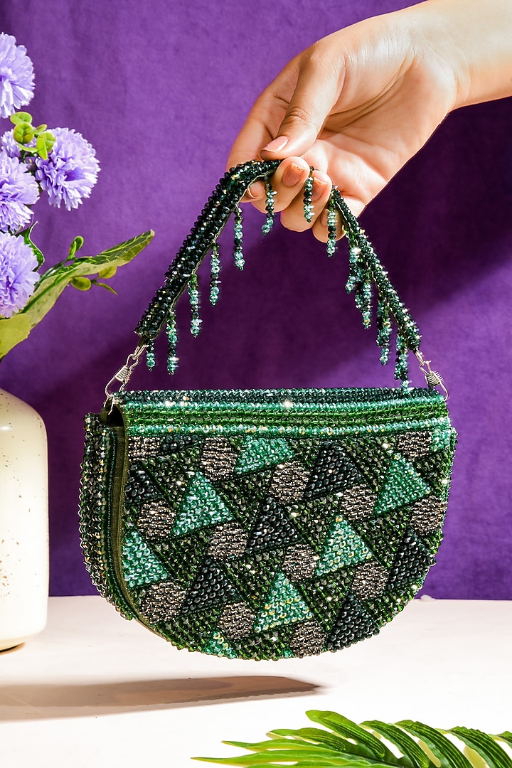 Green Raw Silk Hand Embroidered Latkan Clutch by The Purple Sack at Pernia's Pop Up Shop