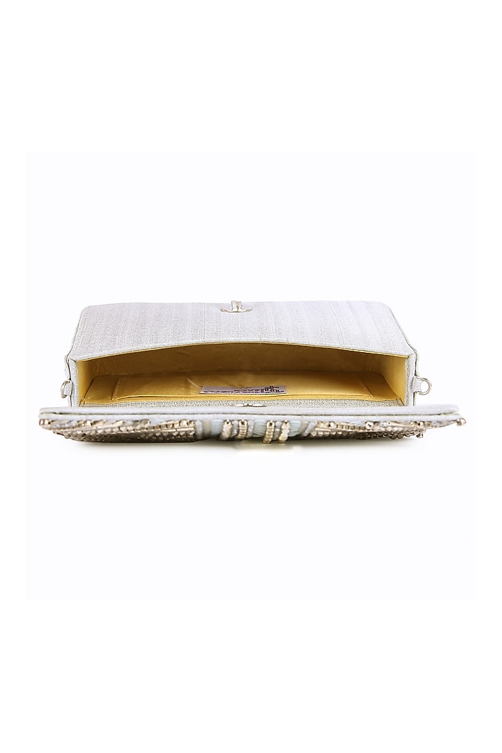 Silver Raw Silk Hand Embroidered Clutch by The Purple Sack at Pernia's Pop Up Shop