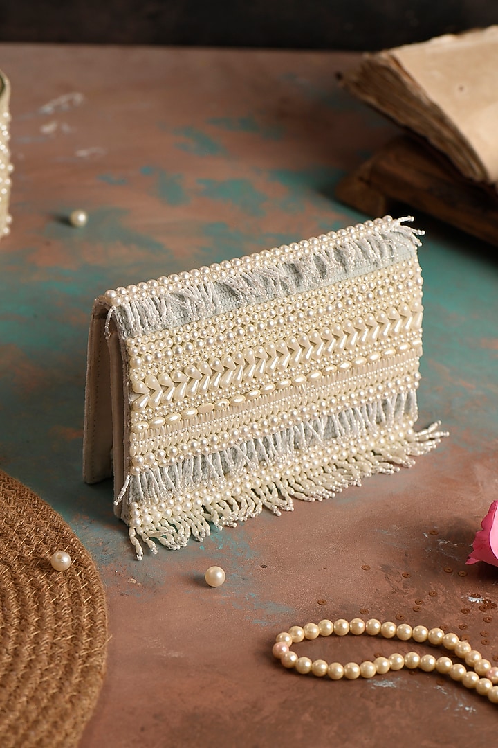 White Raw Silk Hand Embroidered Clutch by The Purple Sack at Pernia's Pop Up Shop
