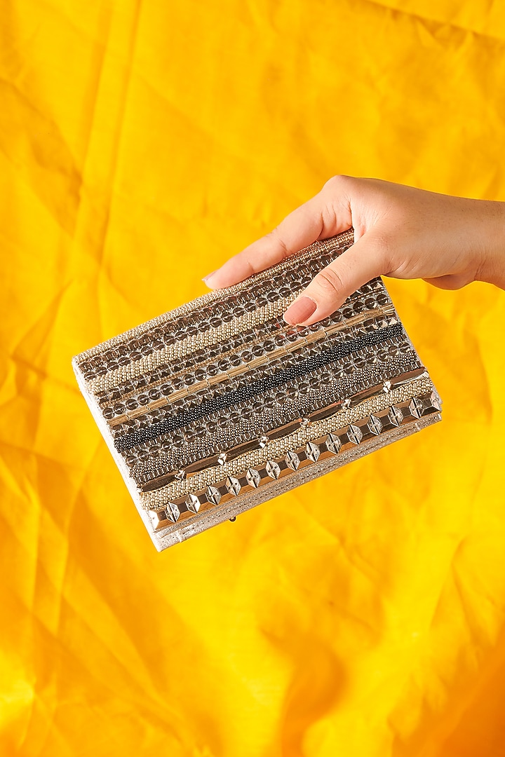 Silver Raw Silk Hand Embroidered Handcrafted Clutch by The Purple Sack at Pernia's Pop Up Shop