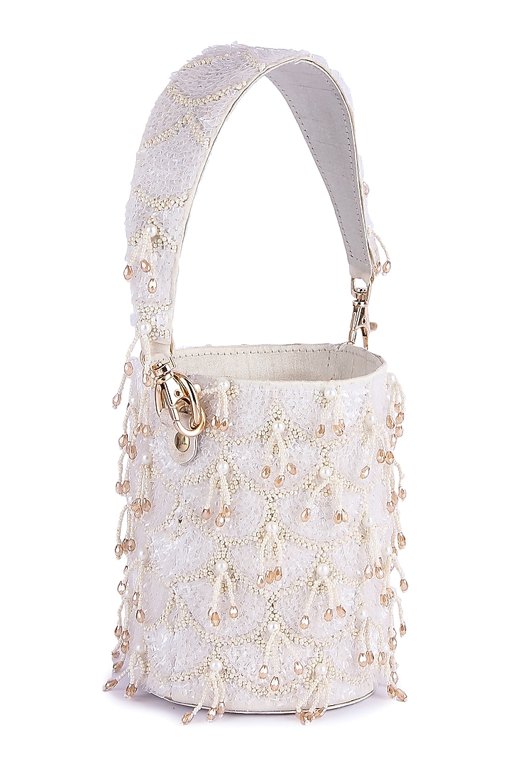 White Raw Silk Hand Embroidered Potli by The Purple Sack at Pernia's Pop Up Shop