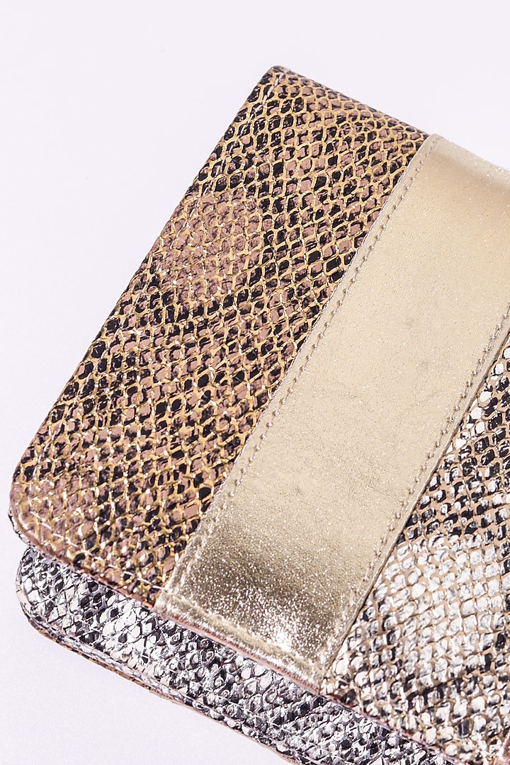 Multi-Colored Leatherette Patchwork Clutch by The Purple Sack at Pernia's Pop Up Shop