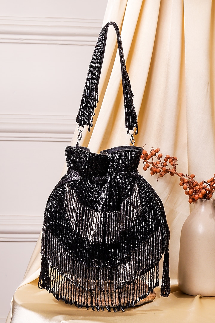 Multi-Colored Raw Silk Hand Embroidered Potli by The Purple Sack at Pernia's Pop Up Shop