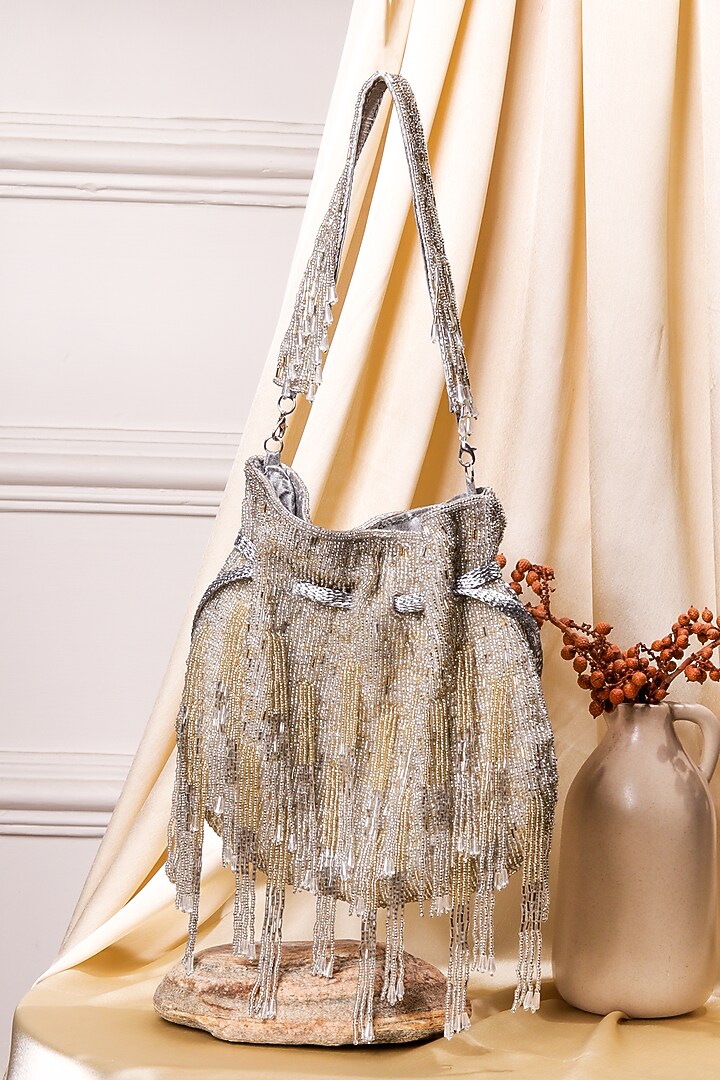 Multi-Colored Raw Silk Hand Embroidered Potli by The Purple Sack at Pernia's Pop Up Shop