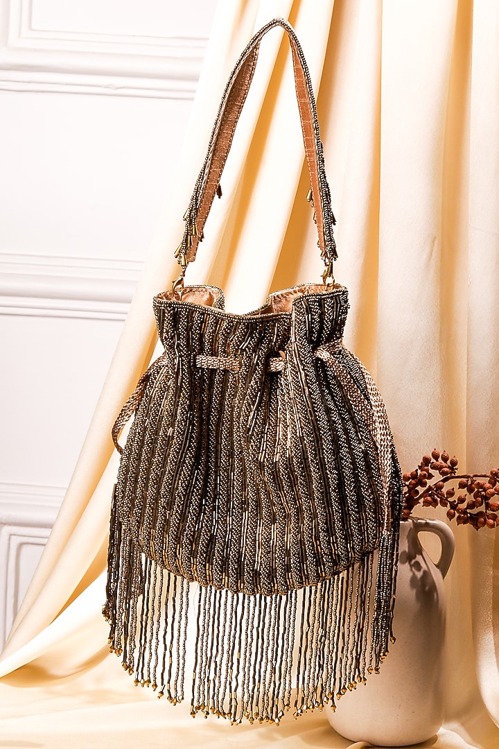 Multi-Colored Raw Silk Hand Embroidered Potli by The Purple Sack at Pernia's Pop Up Shop