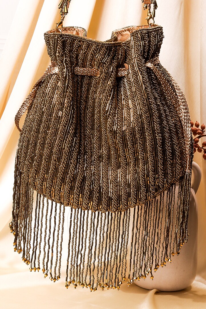 Multi-Colored Raw Silk Hand Embroidered Potli by The Purple Sack at Pernia's Pop Up Shop