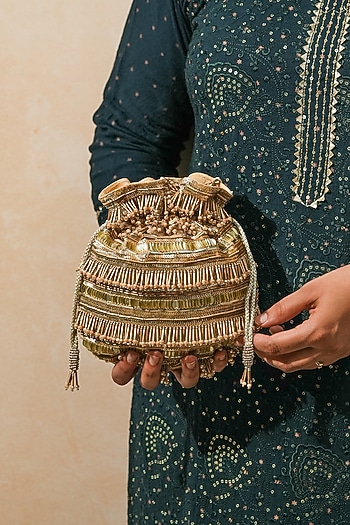 Gold Raw Silk Handcrafted Potli by The Purple Sack at Pernia's Pop Up Shop