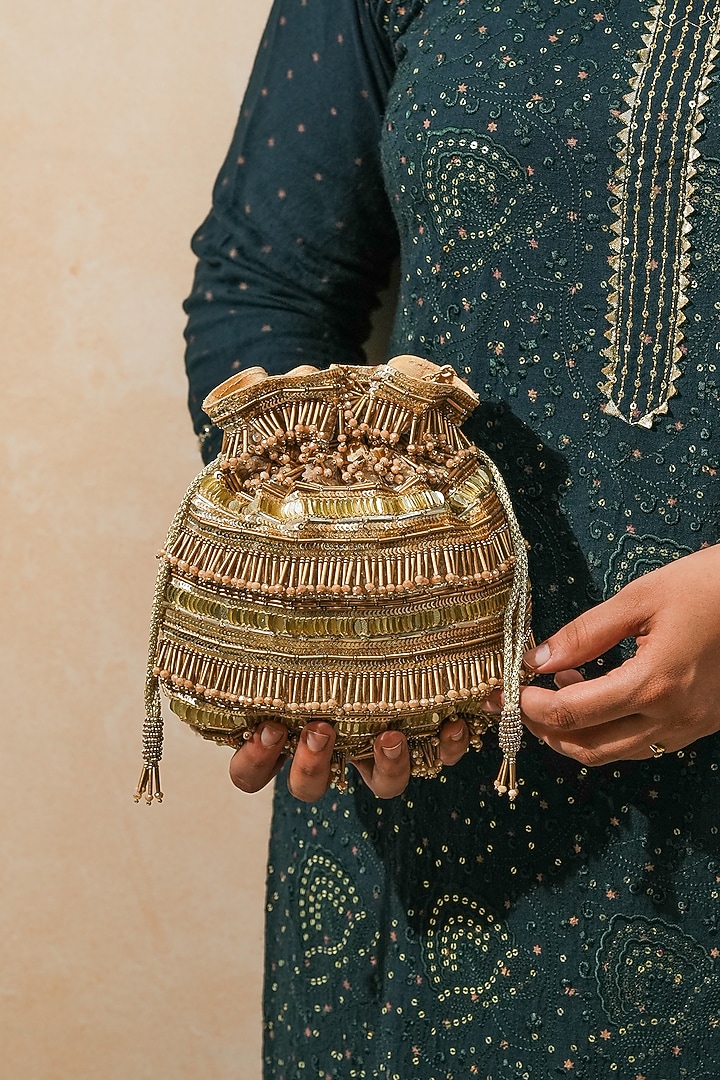 Gold Raw Silk Handcrafted Potli by The Purple Sack at Pernia's Pop Up Shop