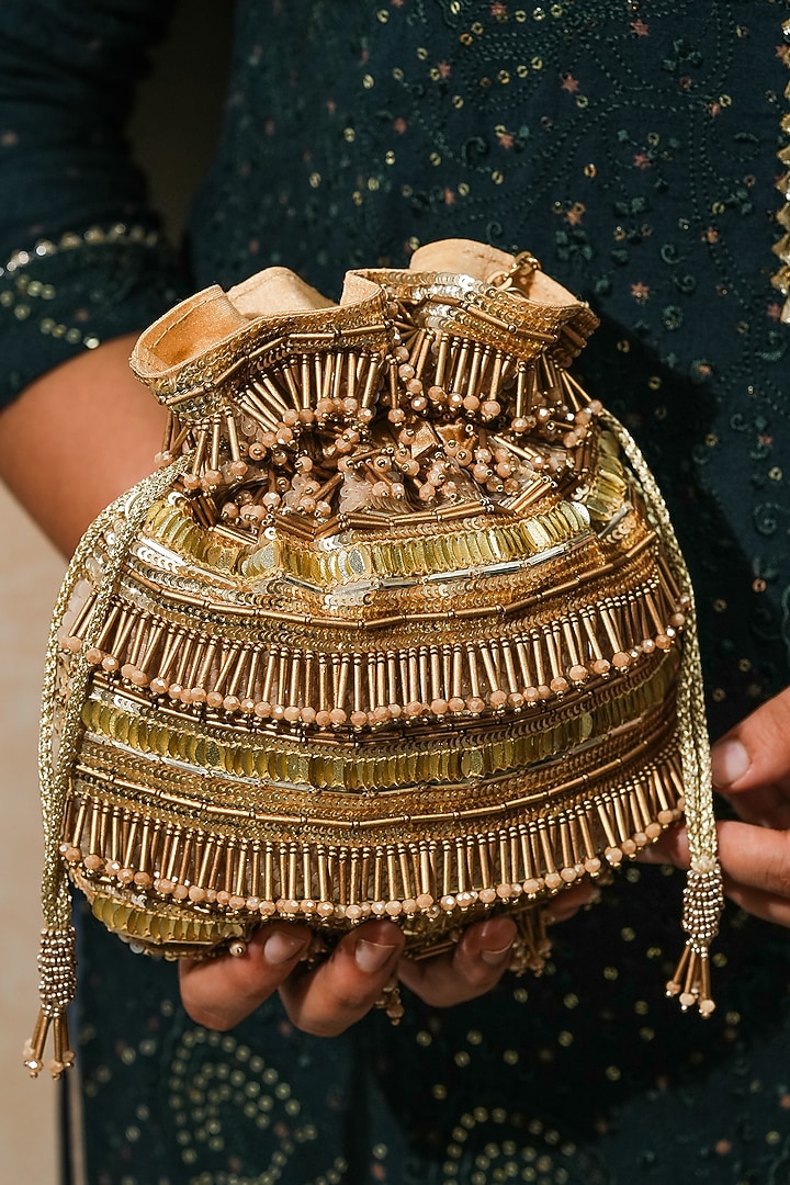 Gold Raw Silk Handcrafted Potli by The Purple Sack at Pernia's Pop Up Shop