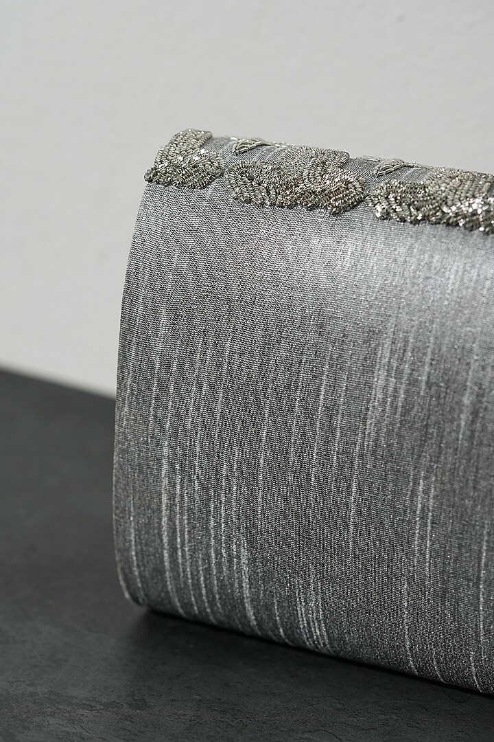 Silver Raw Silk Handcrafted Clutch by The Purple Sack at Pernia's Pop Up Shop