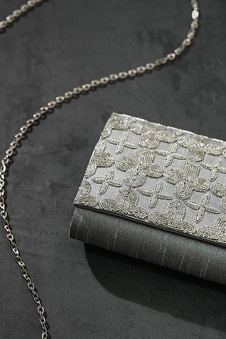 Silver Raw Silk Handcrafted Clutch by The Purple Sack at Pernia's Pop Up Shop