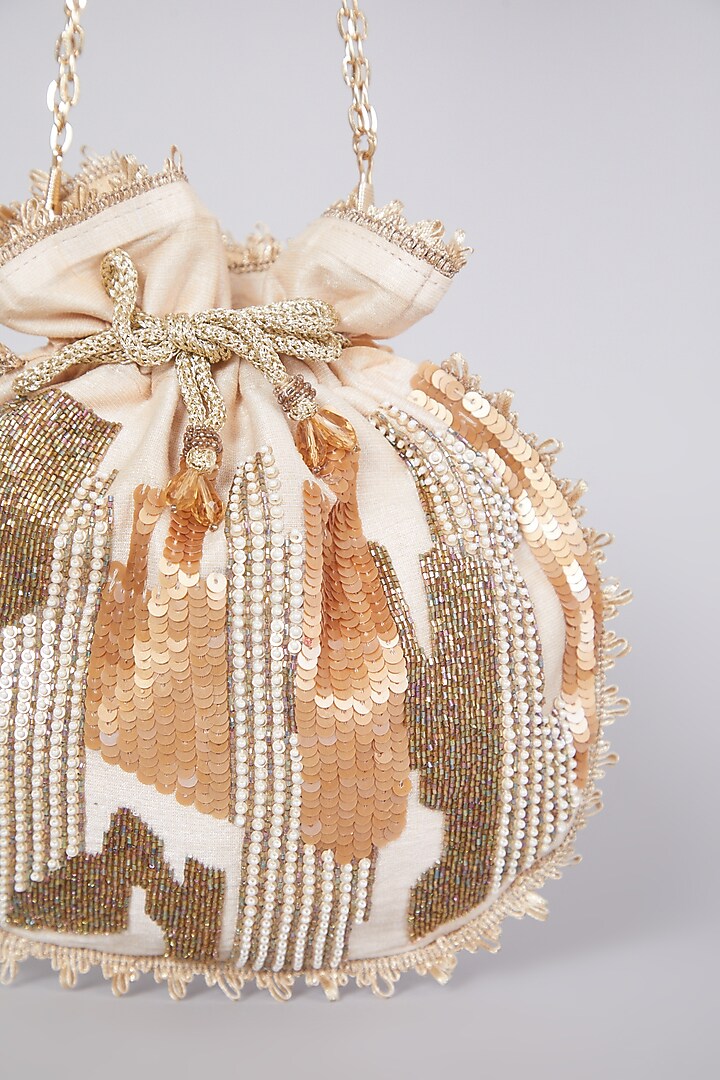 Gold Raw Silk Hand Embroidered Potli by The Purple Sack at Pernia's Pop Up Shop