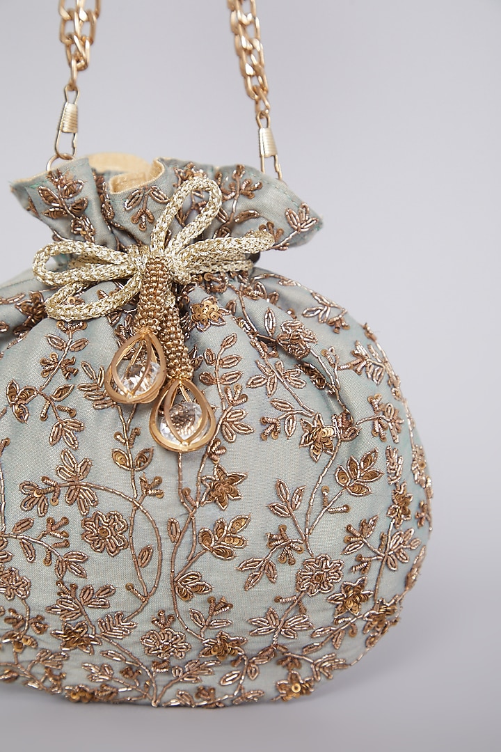 Ice Blue Hand Embroidered Raw Silk Potli by The Purple Sack at Pernia's Pop Up Shop