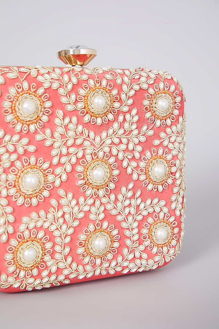 Coral Hand Embroidered Raw Silk Potli by The Purple Sack at Pernia's Pop Up Shop