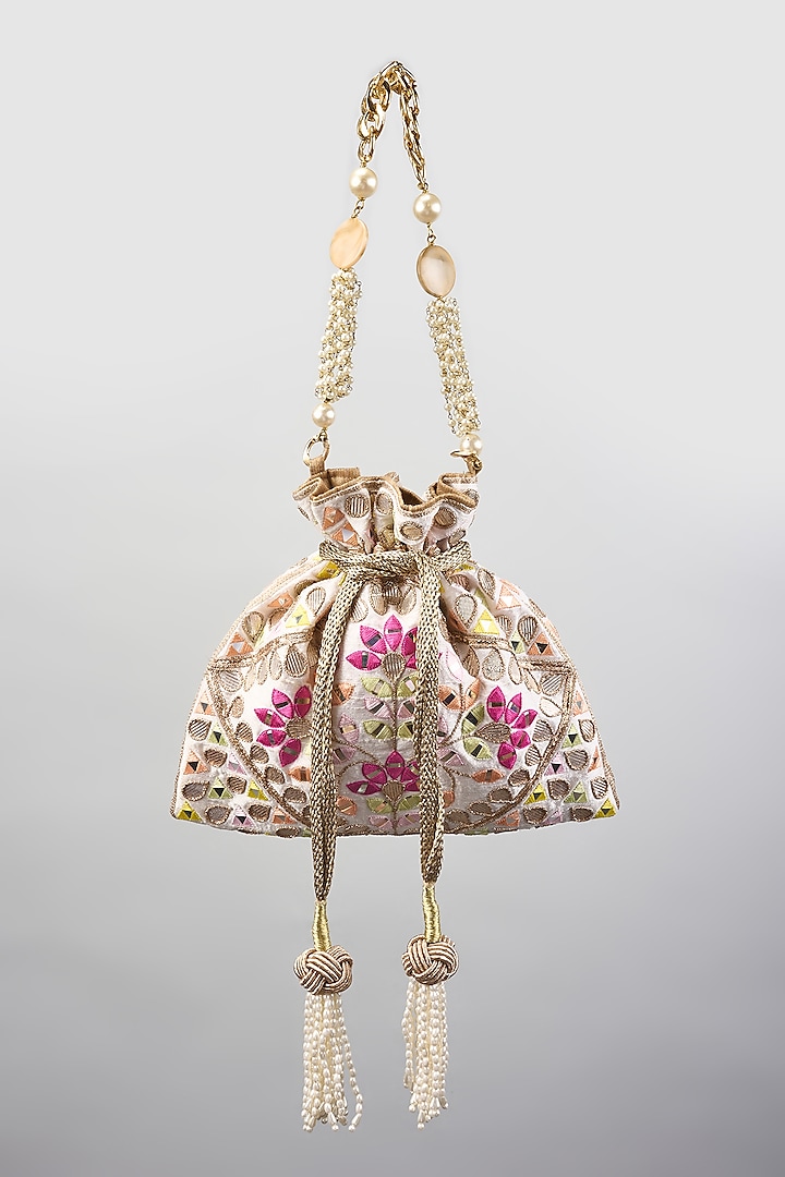 Ivory Raw Silk Embroidered Potli by The Pink Potli at Pernia's Pop Up Shop