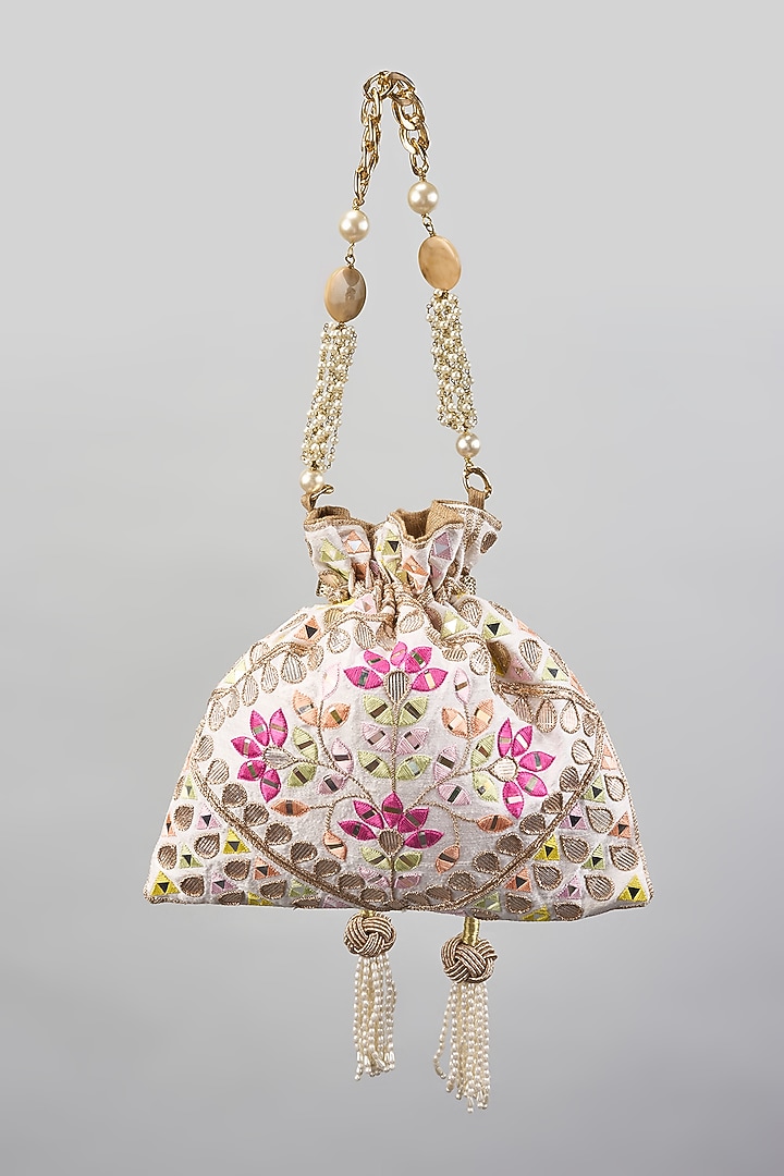 Ivory Raw Silk Embroidered Potli by The Pink Potli at Pernia's Pop Up Shop