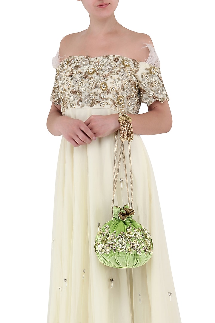 Lime green hand embroidered potli bag available only at Pernia's Pop Up Shop.