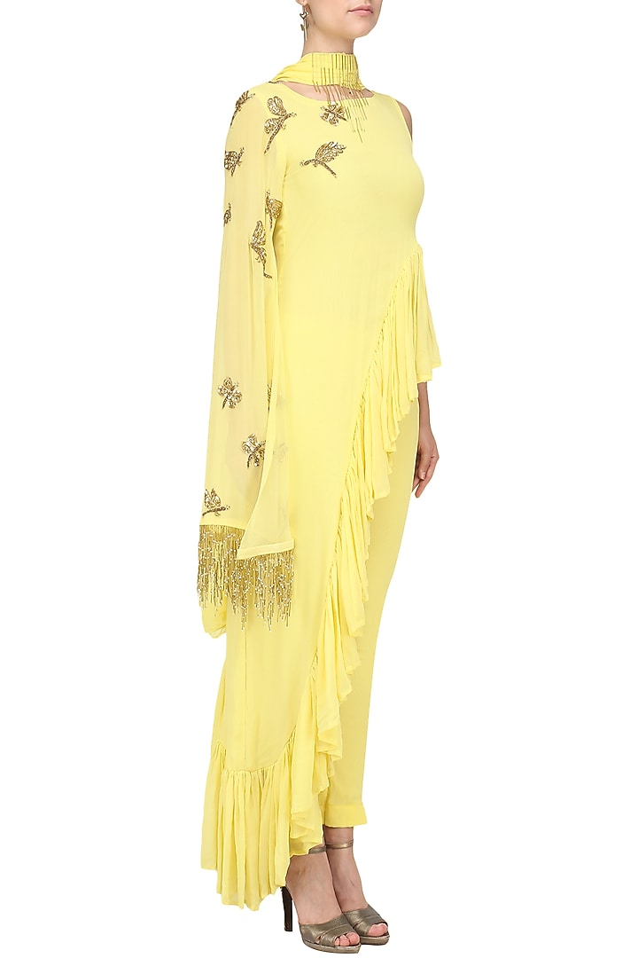 Soft yellow frilled peplum tunic and pants available only at Pernia's Pop Up Shop.