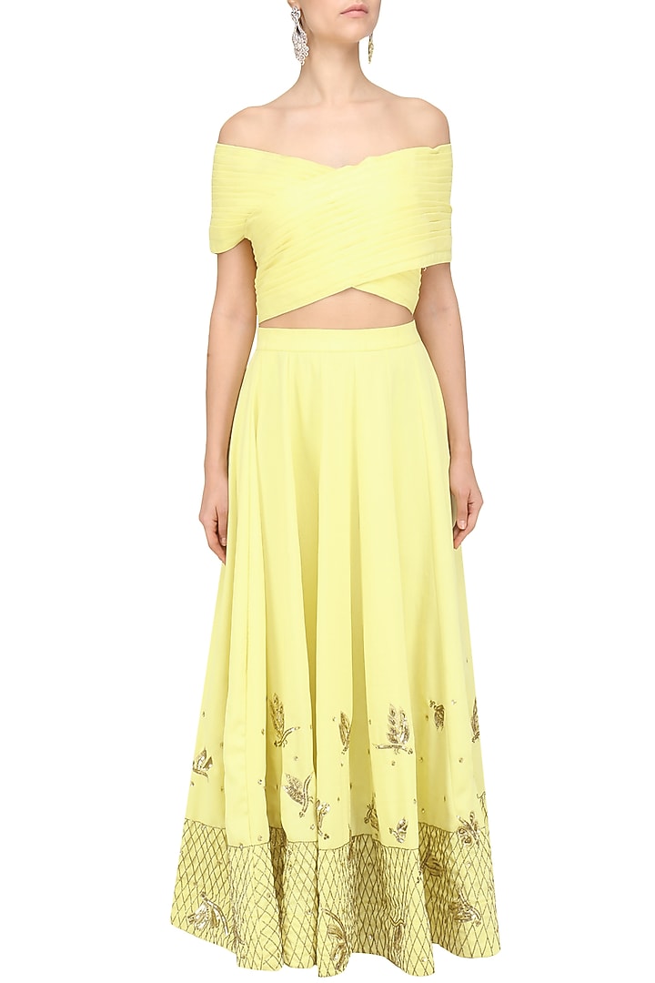 Soft yellow off shoulder crop top and pleated skirt set available only at Pernia's Pop Up Shop.