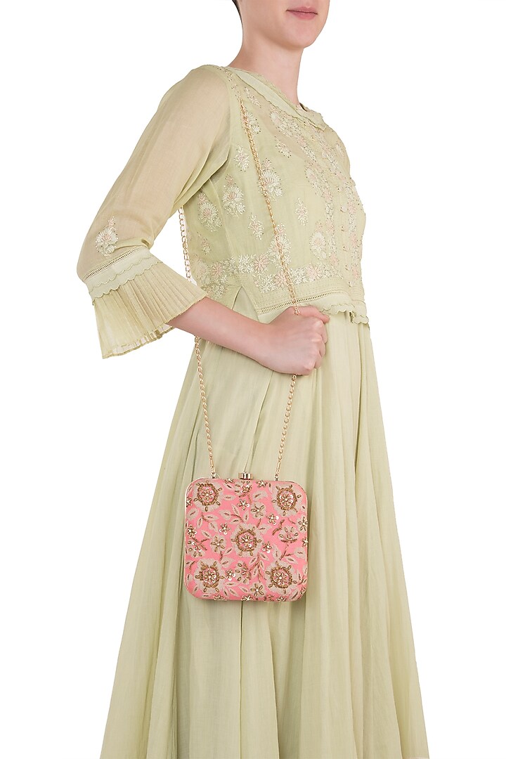Pink embroidered square clutch available only at Pernia's Pop Up Shop.