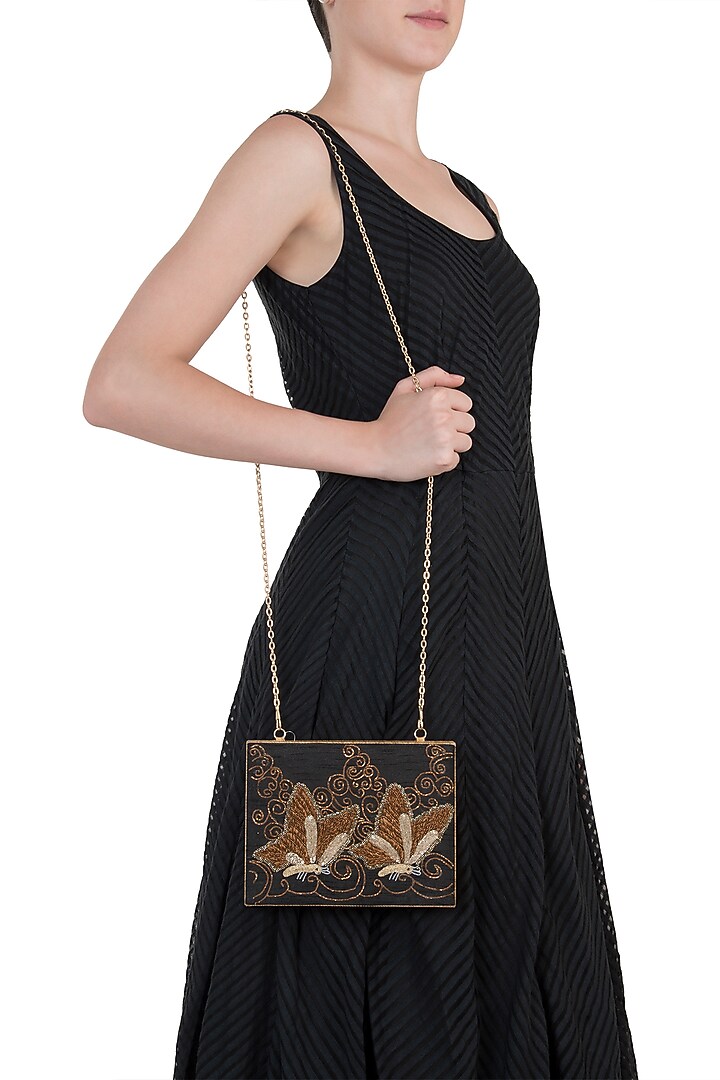 Black butterfly embroidered clutch available only at Pernia's Pop Up Shop.