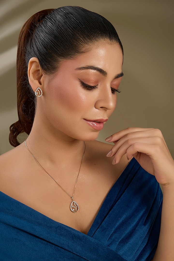 Gold Finish Zircon Pendant Set In Sterling Silver by TRETA BY BR DESIGNS at Pernia's Pop Up Shop