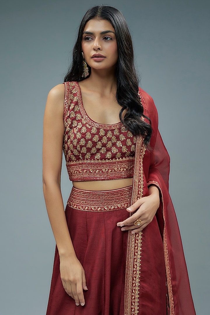 Maroon Raw Silk Cutdana Hand Embroidered Wedding Lehenga Set by Trisvaraa at Pernia's Pop Up Shop