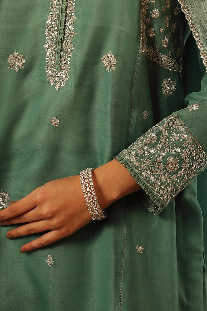 Turquoise Blue Handwoven Katan Silk Embroidered Kurta Set by Trisvaraa at Pernia's Pop Up Shop