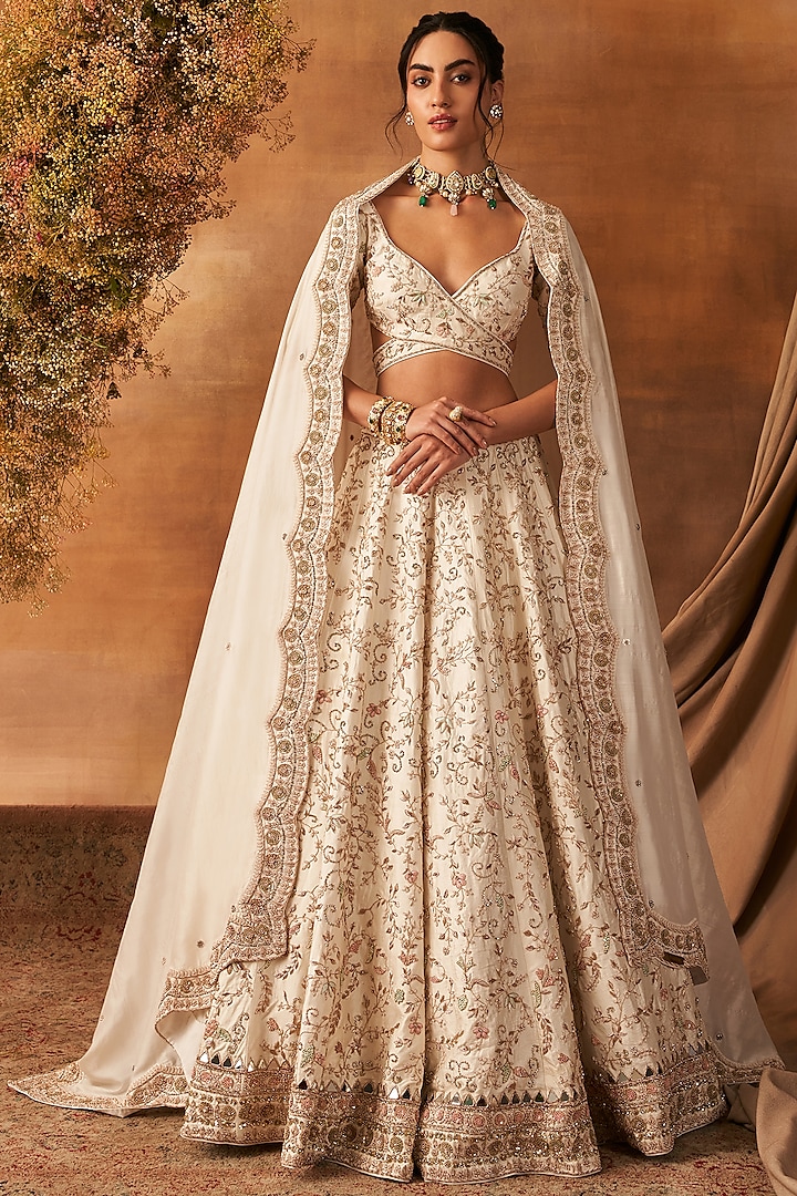 Ivory Handwoven Khurkhul Silk Nakshi Embroidered Lehenga Set by 11 Tareng at Pernia's Pop Up Shop